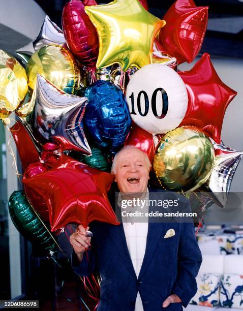 Legendary comedian Bob Hope with balloons to celebrate his 100th birthday on May 29th 2003 at his home in Palm Springs, California. .