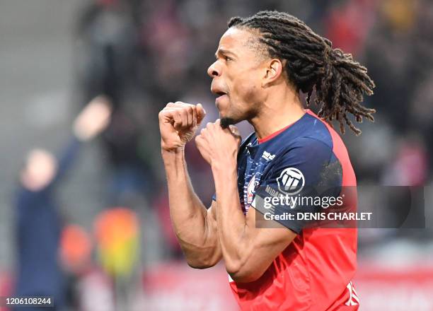 Lille's French forward Loic Remy celebrates a goal during the French L1 football match between Lille LOSC and Olympique Lyonnais at the Pierre-Mauroy...