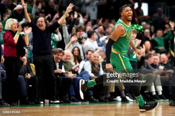 Marcus Smart of the Boston Celtics celebrates after scoring against the LA Clippers at TD Garden on February 13, 2020 in Boston, Massachusetts. The...