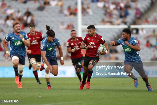 Richie Mo'unga of the Crusaders makes a break during the round 3 Super Rugby match between the Blues and the Crusaders at Eden Park on February 14,...