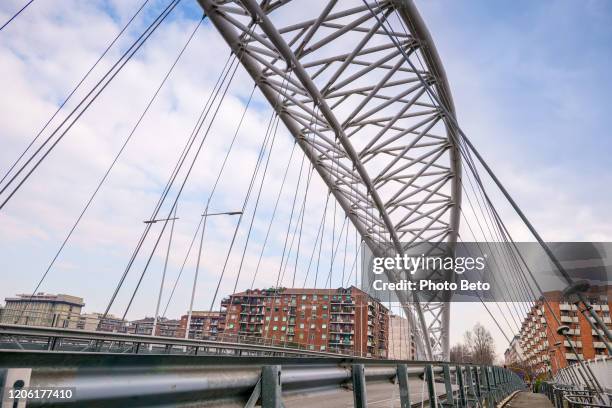 the modern arched structure of the settimia spizzichino road bridge in the ostiense district in southern rome - gas container stock pictures, royalty-free photos & images