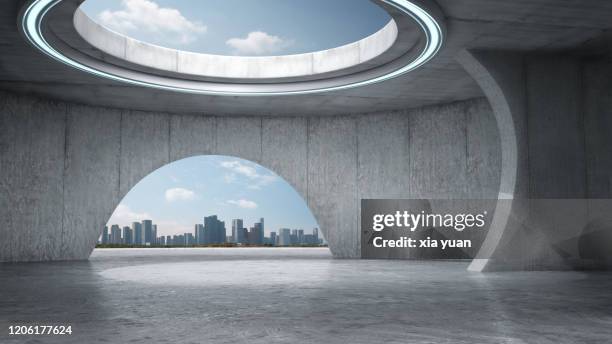 empty abstract concrete space with city skyline - background concrete indoor stock-fotos und bilder