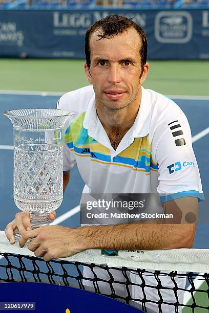 Radek Stepanek of the Czech Republic poses for photographers after defeating Gael Monfils of France in the final of the Legg Mason Tennis Classic...