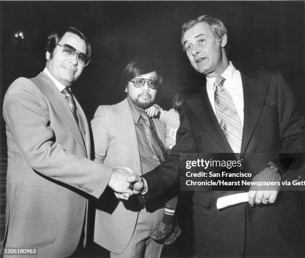The Rev. Jim Jones , Rev. A.C. "Tony" Ubalde Jr.‡ and Mayor George Moscone. Jones and Ubalde were sworn in as housing commissioners by Moscone at...