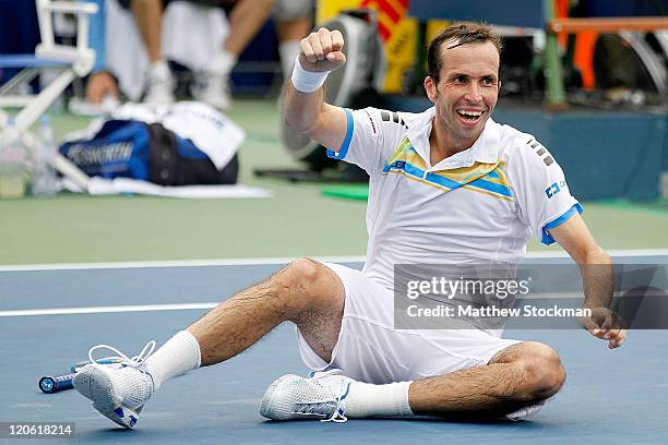 Radek Stepanek of the Czech Republic falls to the court at match point against Gael Monfils of France in the final of the Legg Mason Tennis Classic...