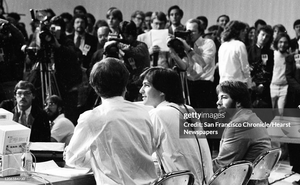 April 23, 1984: Apple executives John Sculley, Steve Jobs and Steve Wozniak introduce the Apple Iic at the "Apple II Forever" event at Moscone Center in San Francisco.