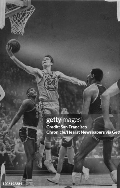 Rick Barry in action for the San Francisco Warriors vs the Philadelphia 76ers ;Photo ran