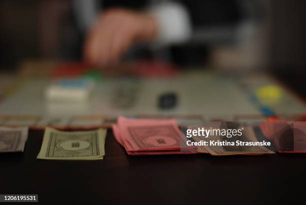 a child playing a board game - cash contest stock pictures, royalty-free photos & images