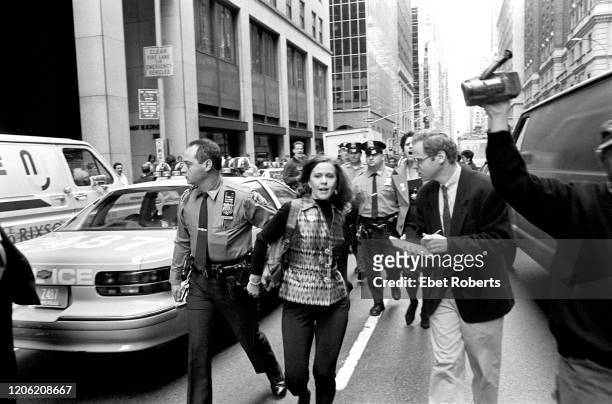 Kate Pierson of The B-52's being arrested at a PETA Vogue Fur protest in New York City on September 30, 1993.