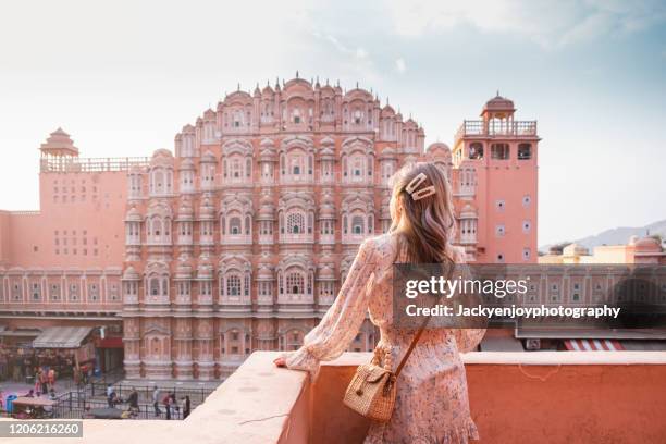 beautiful asian female sightseeing and sunset over hawa mahal at pink city jaipur rajasthan india - indian royalty stock pictures, royalty-free photos & images