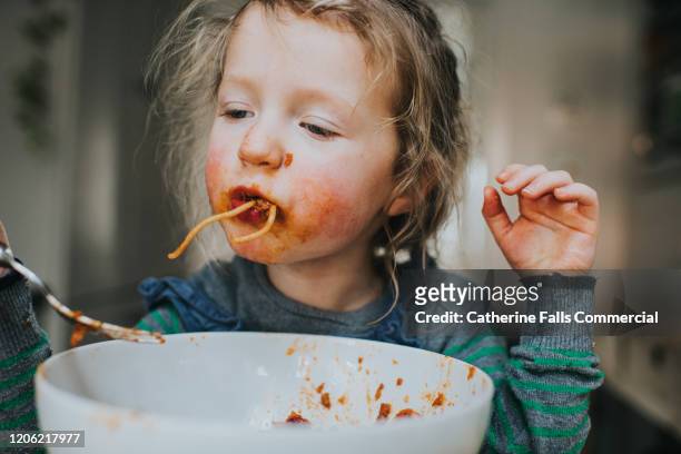 Child eating Spaghetti