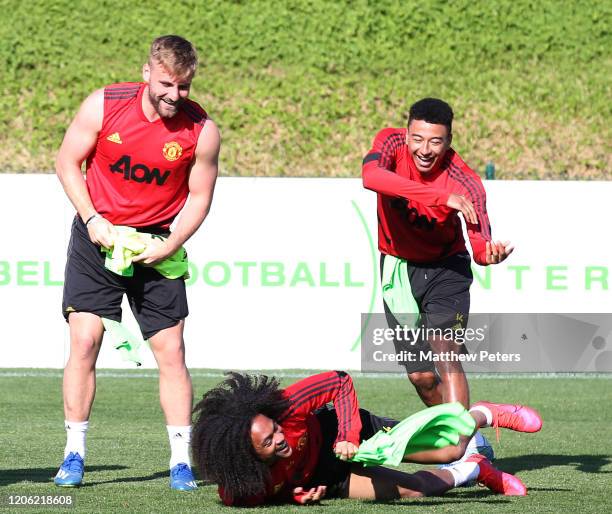 Luke Shaw, Jesse Lingard and Tahith Chong of Manchester United in action during a first team training session on February 14, 2020 in Malaga, Spain.