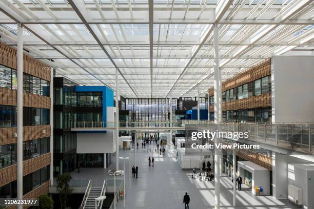 Elevated view across interior street. Research Centre of the Urbalad Campus, Michelin, Cebazat, France. Architect: Chaix & Morel et AssociŽs, 2018.