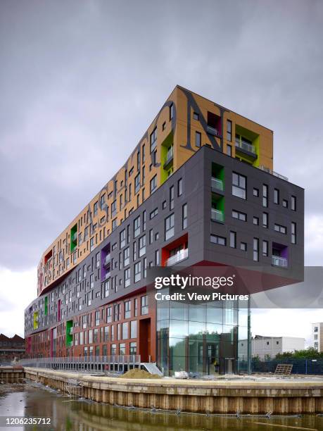 Oblique corner elevation with stacked volumes. Chips, Manchester, United Kingdom. Architect: Alsop, 2012.