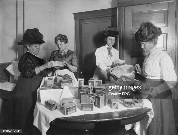 Four women packaging butter substitute, "Churngold Oleomargerine", manufactured by the Ohio Butterine Company and sold at 25 cent to boycott butter...