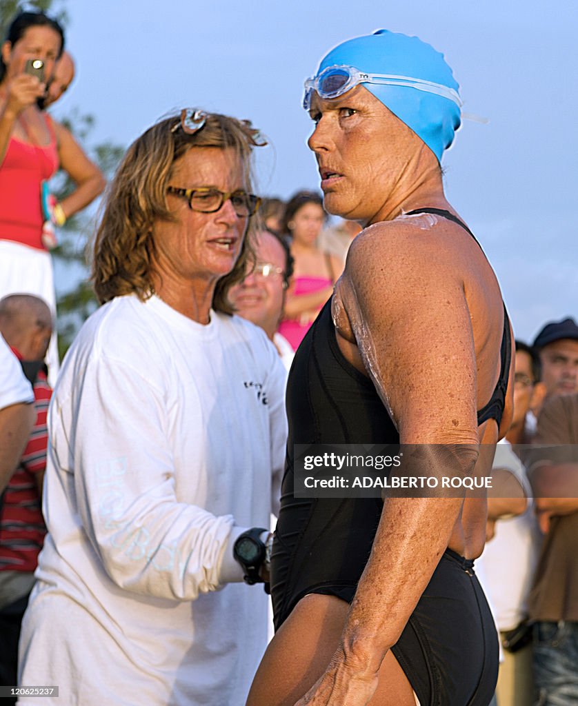 US swimmer Diana Nyad puts cream on at E