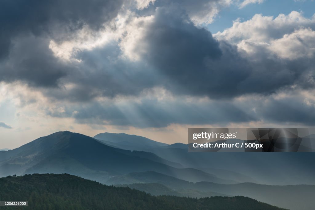 Clouds over mountain landscape