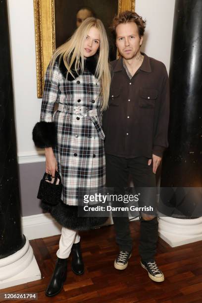 Gabriella Wilde and Alan Pownall attend the Shrimps show during London Fashion Week February 2020 on February 14, 2020 in London, England.
