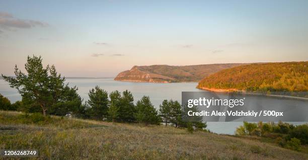 tranquil landscape with hills and volga river, russia - volga stock-fotos und bilder