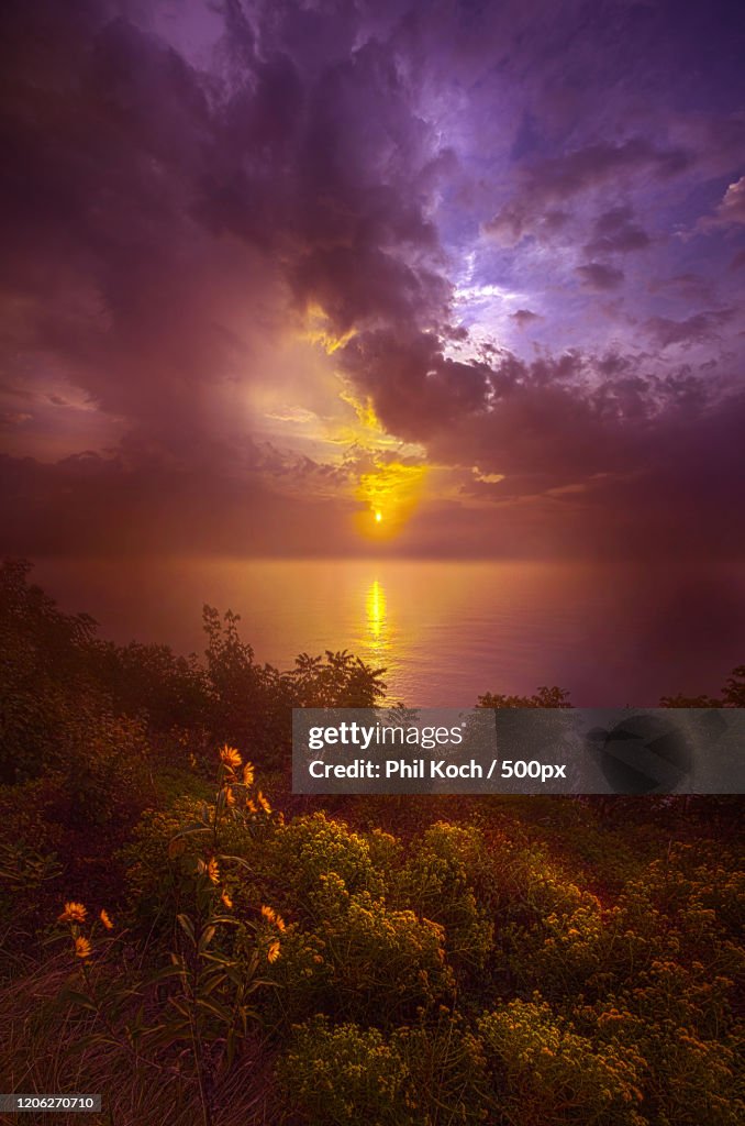 View of sunset above sea, Wind Point, Wisconsin, USA