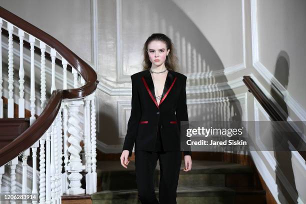 Model walks the runway at ROSSI TUXEDO, New York Fashion Week, Fall 2020 Collection at Consulate of Argentina on February 11, 2020 in New York City.