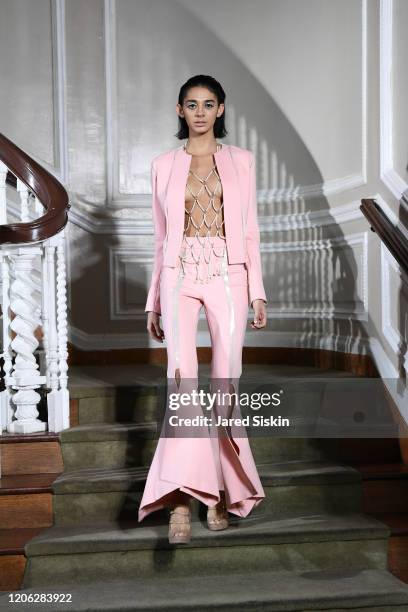 Model walks the runway at ROSSI TUXEDO, New York Fashion Week, Fall 2020 Collection at Consulate of Argentina on February 11, 2020 in New York City.