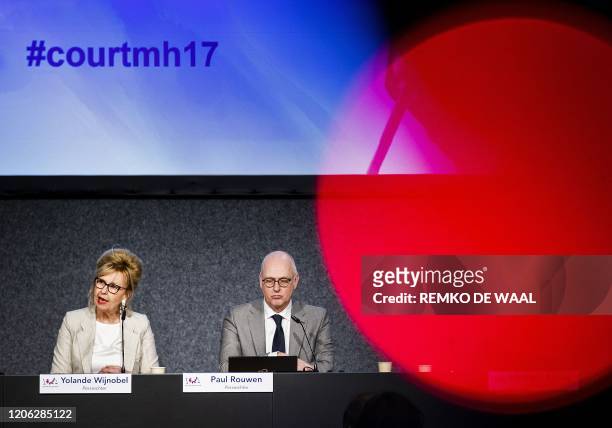 District Court of The Hague Dutch press judge Yolande Wijnnobel speaks past Dutch press judge Paul Rouwen about the first session of the...