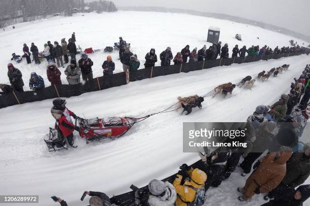 Laura Neese drives her team during the restart of the 2020 Iditarod Sled Dog Race at Willow Lake on March 8, 2020 in Willow, Alaska.