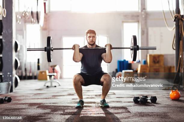 beendag - weight lifting stockfoto's en -beelden