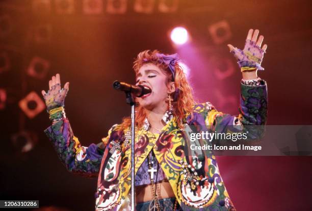 American, singer, songwriter and actress, Madonna, on stage during The Virgin Tour on May 25 at Cobo Arena in Detroit, Michigan.