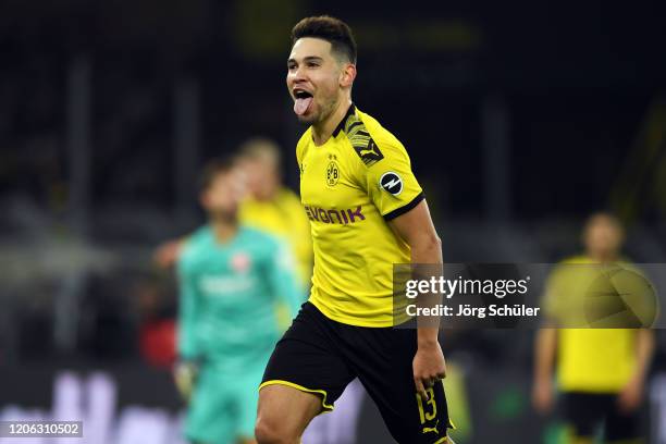 Raphael Guerreiro of Dortmund celebrates his team's fourth goal during the Bundesliga match between Borussia Dortmund and Eintracht Frankfurt at...