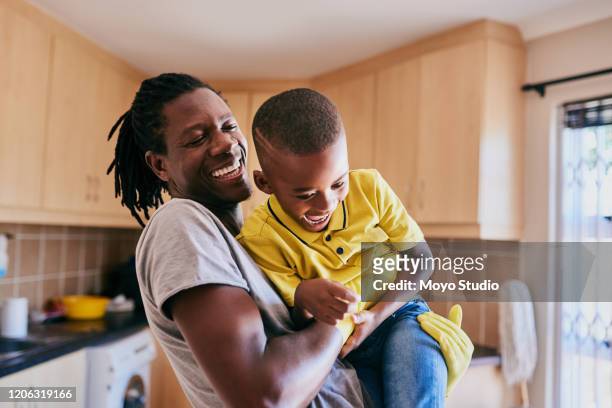 cleaning time doesn't have to be all boring - african ethnicity stock pictures, royalty-free photos & images