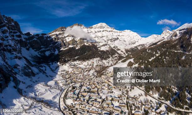 stunning aerial view of the leukerbad village in the alps in canton valais, switzerland - leukerbad stock pictures, royalty-free photos & images