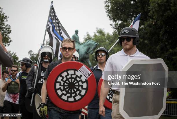 White supremacist groups rally in Emancipation Park during the Unite the Right Rally, August 12, 2017.