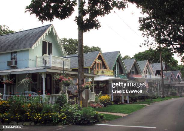 colorful fairytale houses in a neighborhood in martha’s vineyard, ma - massachusetts flag stock pictures, royalty-free photos & images