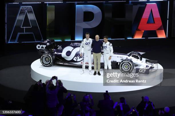 Driver Daniil Kvyat, Team Principal Franz Tost and F1 driver Pierre Gasly present the 2020 F1 car "AT01" during the Scuderia AlphaTauri launch event...