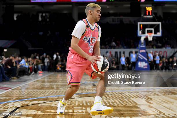 Bad Bunny of Team Wilbon dribbles the ball during the 2020 NBA All-Star Celebrity Game Presented By Ruffles at Wintrust Arena on February 14, 2020 in...