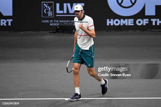 Reilly Opelka of the United States celebrates after winning the first set during his Men's Singles quarterfinal match against Jason Jung of Taiwan on...