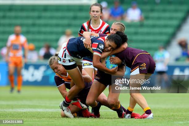 Simaima Taufa of the Roosters lays a tackle on the broncos during the match between the Roosters and Broncos from Day 2 of the 2020 NRL Nines at HBF...