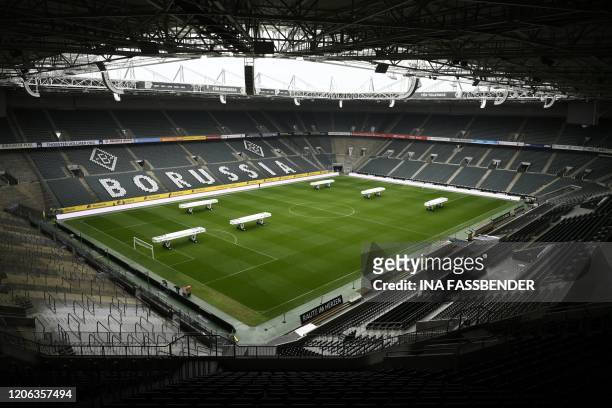 The empty Borussia-Park football stadium is pictured on March 10, 2020 in Mönchengladbach. - Rhine Bundesliga derby between Borussia Moenchengladbach...