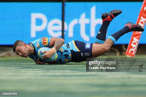 Ash Taylor of the Titans crosses for a try during Day 2 of the 2020 NRL Nines between the Gold Coast Titans and the Wests Tigers at HBF Stadium on...