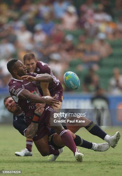 Edwin Ipape of the Sea Eagles offloads the ball while being tackled by Josh McGuire of the Cowboys during Day 2 of the 2020 NRL Nines between the...