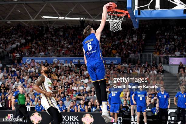 Matthew Hodgson of the Bullets slam dunks during the round 20 NBL match between the Brisbane Bullets and the Cairns Taipans at Nissan Arena on...