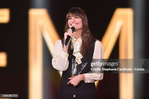 Clara Luciani celebrates after receiving the best female artist award during the 35th 'Les Victoires De La Musique' Show At La Seine Musicale on...