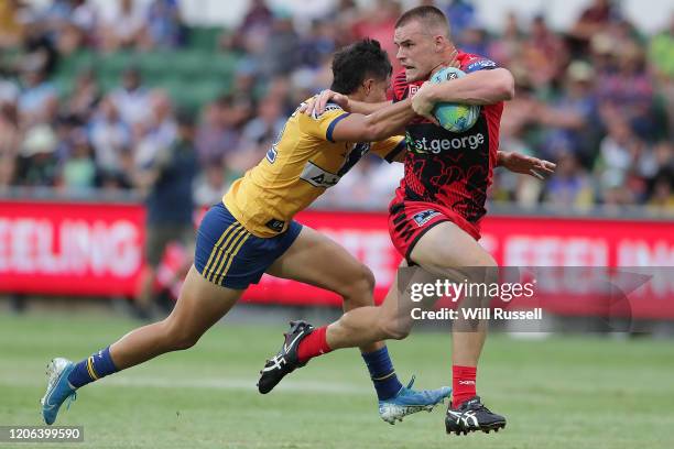 Jackson Ford of the Dragons is tackled by Haze Dunster of the Eels during Day 2 of the 2020 NRL Nines at HBF Stadium on February 15, 2020 in Perth,...