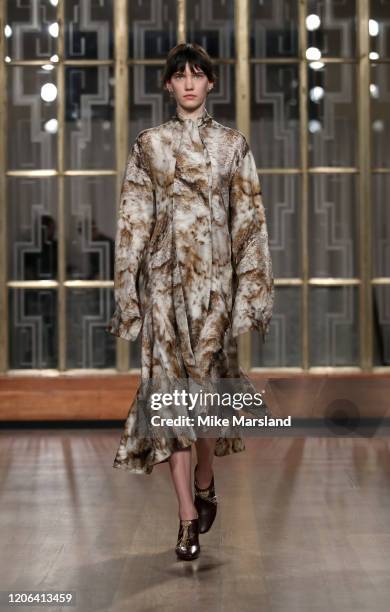 Model walks the runway at the Petar Petrov show during London Fashion Week February 2020 at the Royal Institute of British Architects on February 15,...