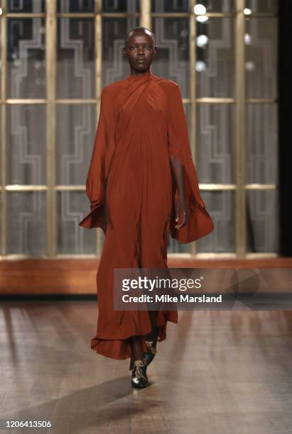 Model walks the runway at the Petar Petrov show during London Fashion Week February 2020 at the Royal Institute of British Architects on February 15,...