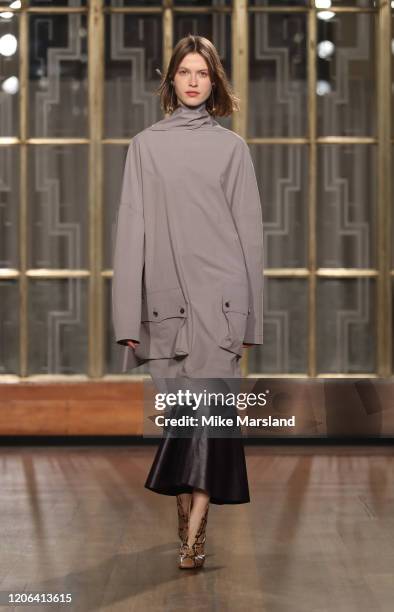 Model walks the runway at the Petar Petrov show during London Fashion Week February 2020 at the Royal Institute of British Architects on February 15,...