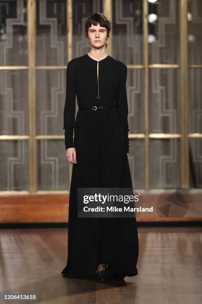 Model walks the runway at the Petar Petrov show during London Fashion Week February 2020 at the Royal Institute of British Architects on February 15,...