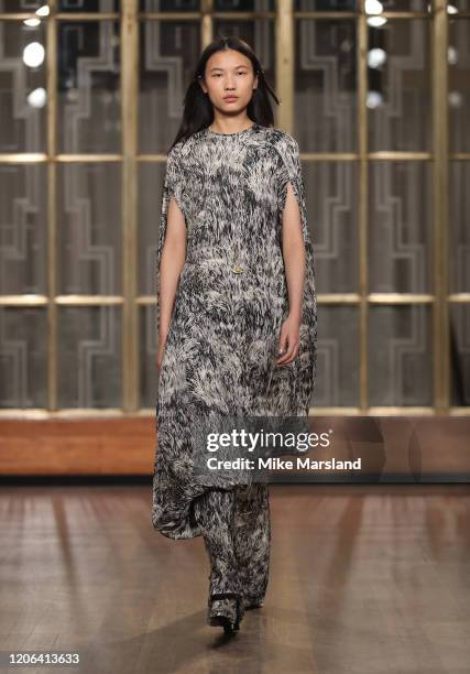 Model walks the runway at the Petar Petrov show during London Fashion Week February 2020 at the Royal Institute of British Architects on February 15,...